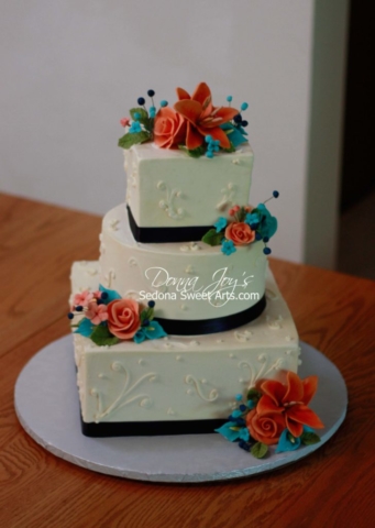 Square Buttercream adorned with Custom colored Sugar Flowers