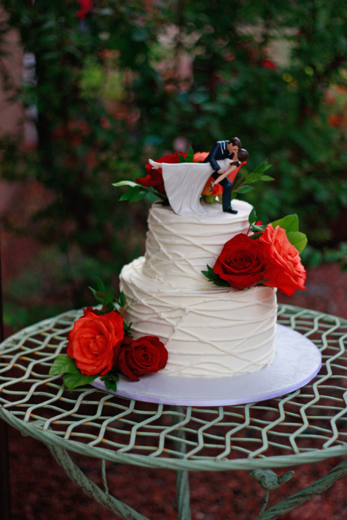 Strings Buttercream adorned with Fresh flowers