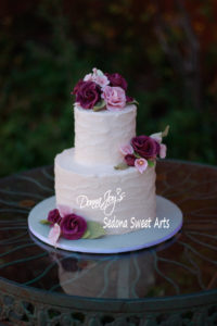 Tuscan waves Wedding cake with handcrafted sugar flowers