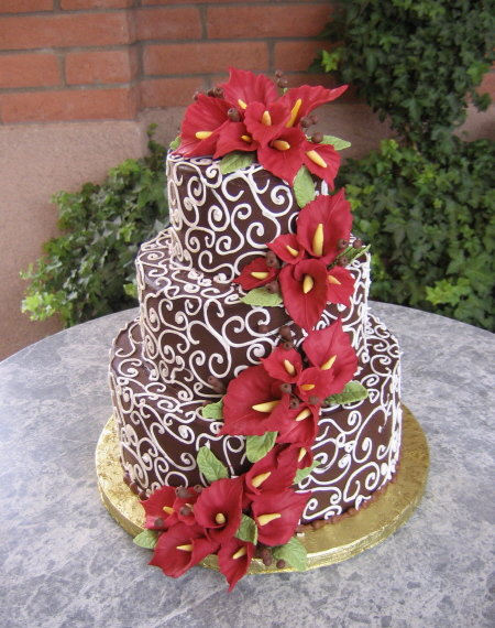 "Tango in Sedona" award winning cake by People Magazine named "Best Wedding Cake- Arizona" Chocolate Ganache Cake is adorned with Donna Joys sugar flowers