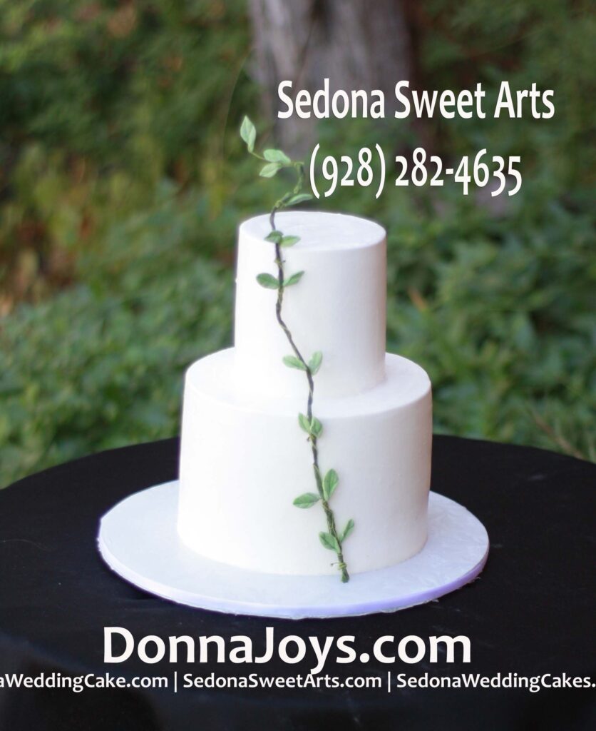 Simple spring vine wedding cake