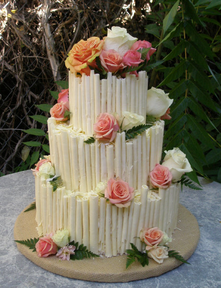 Hand rolled white chocolate cigar wedding cake