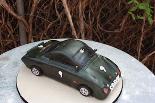 Professional Porshe driver cake Gluten Free