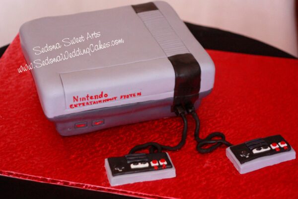 Carved Nintendo game console cake 2011