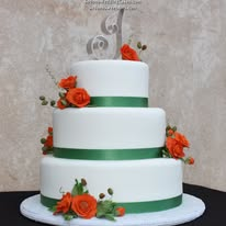 Fondant Wedding cake with Hand sculpted pastillage Sugar Ranunculus by Donna Joy.